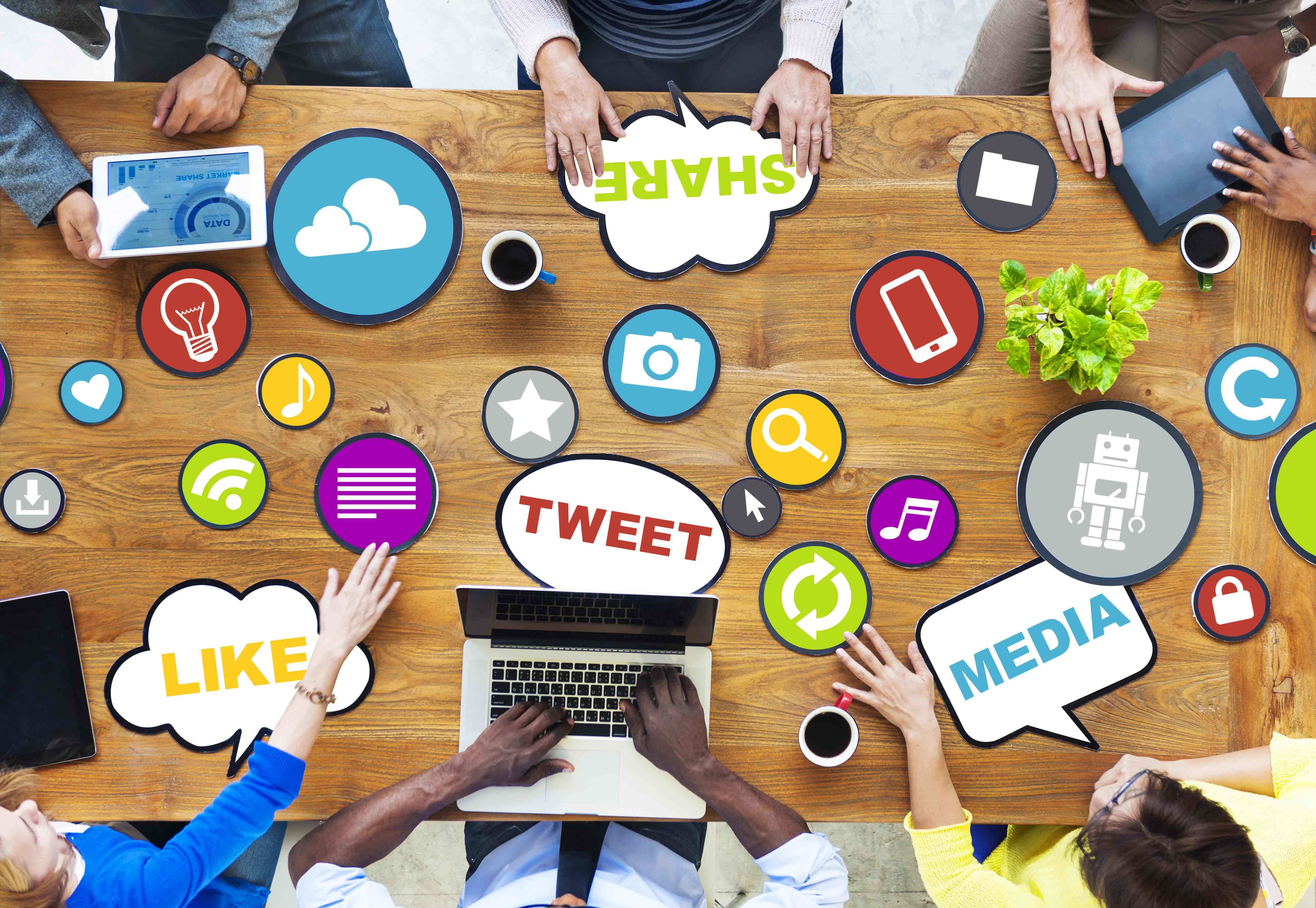 Social Media Marketing. Image of social media icons on desk.